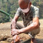 Kaku-Bahadur-Chepang-washing-his-hands-Edit